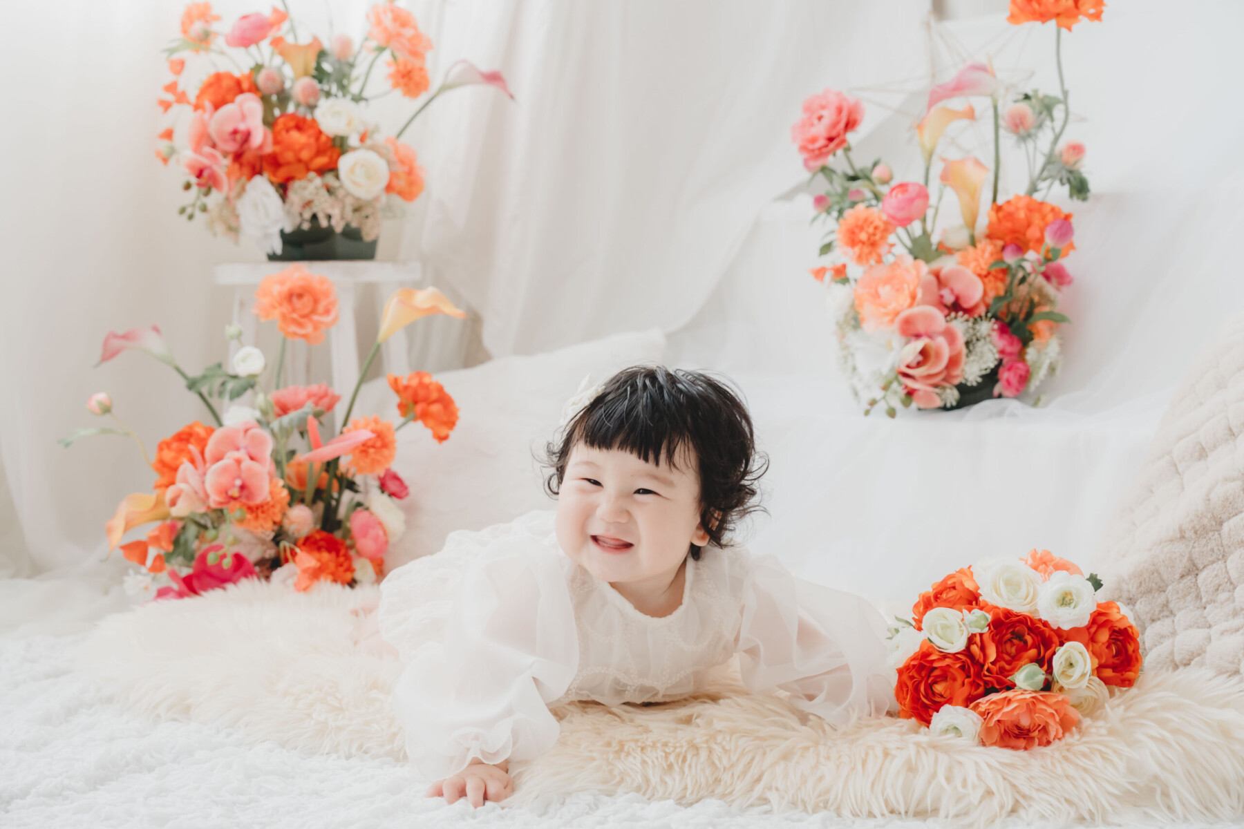 上本町のCobaco Photo Studioで撮影した笑顔のお子さまとフラワーフォト